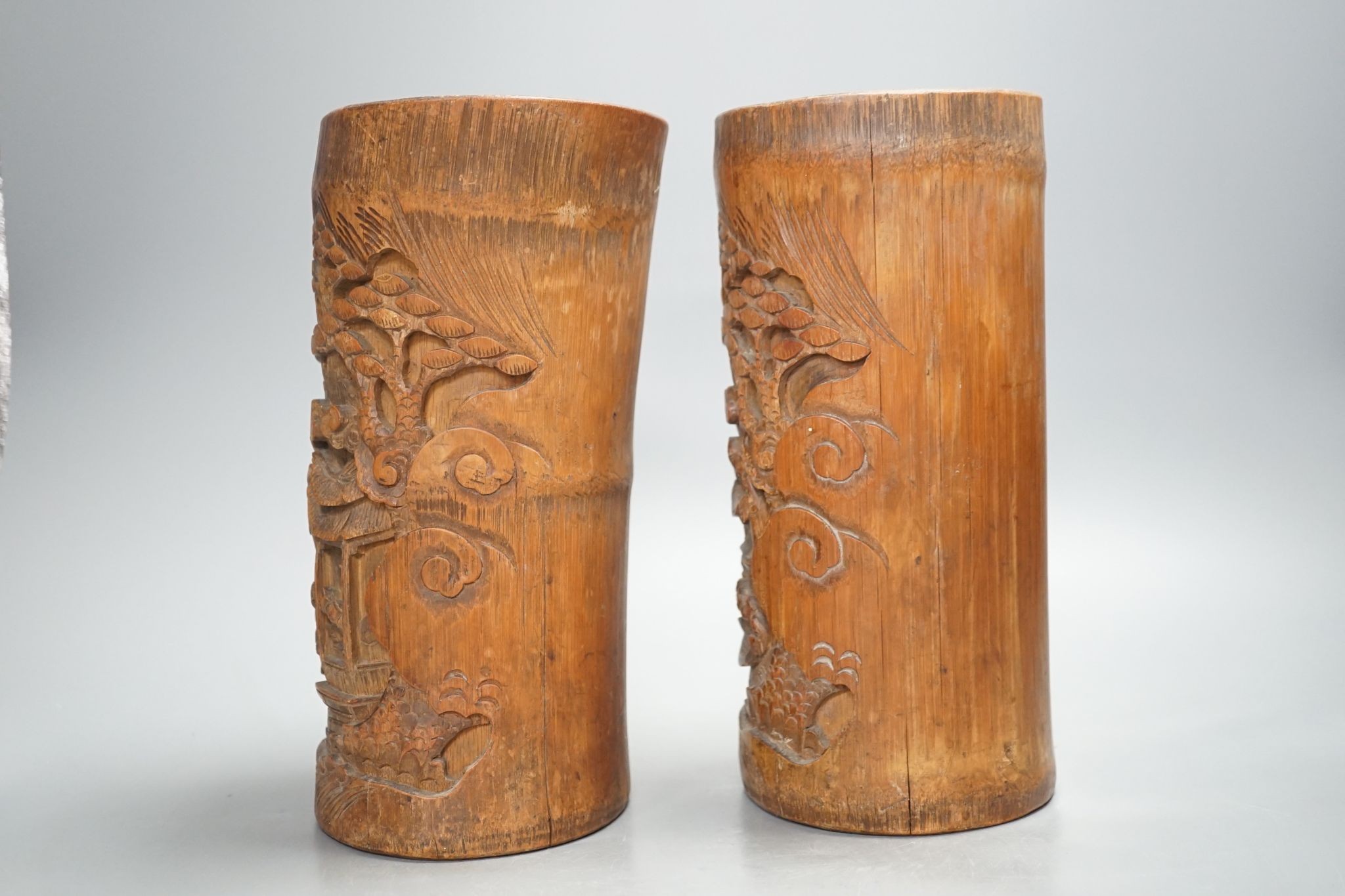 A pair of Chinese carved bamboo brush pots 25cm